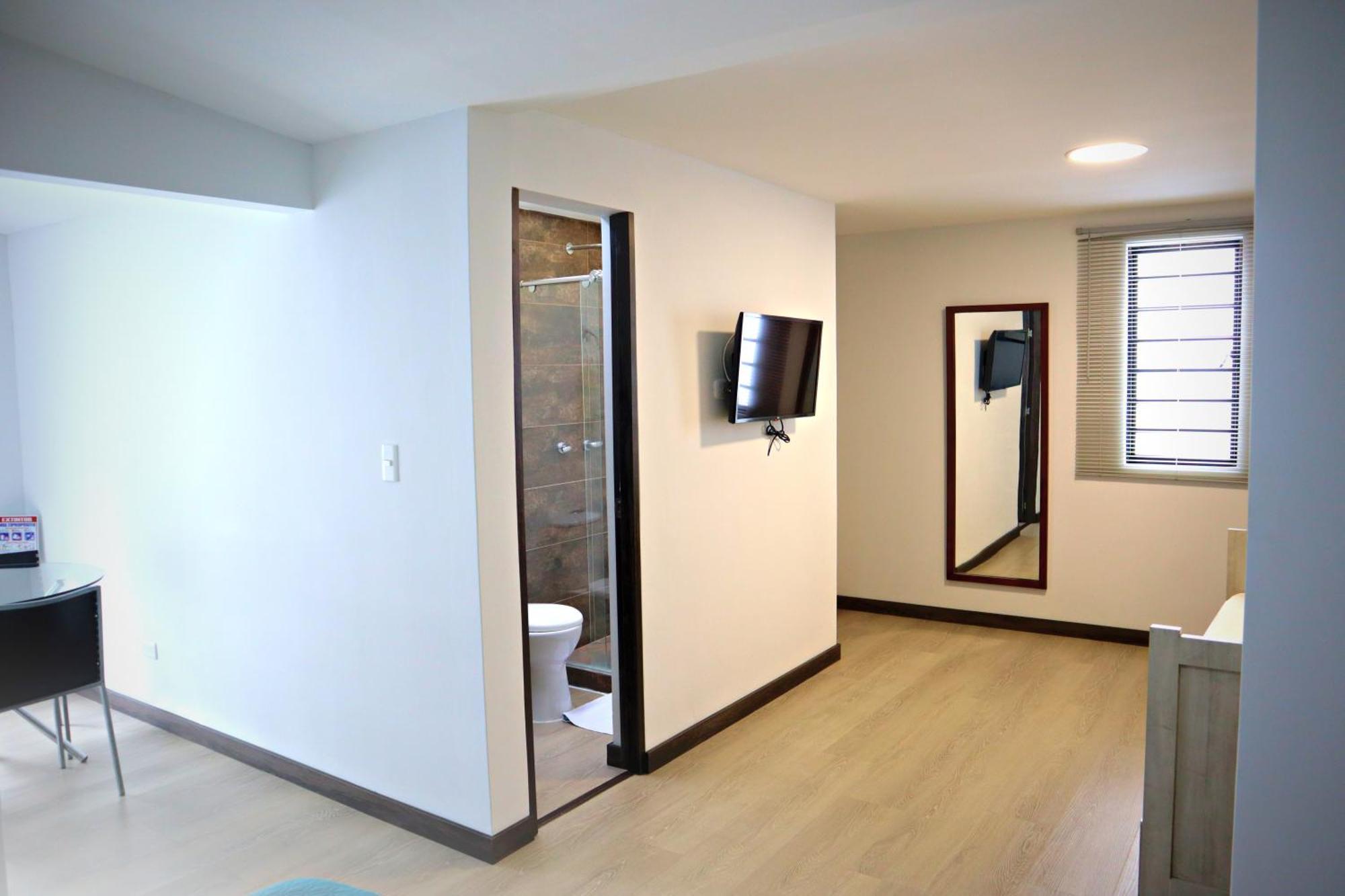 Apartahotel La Arboleda Hc 马尼萨莱斯 外观 照片