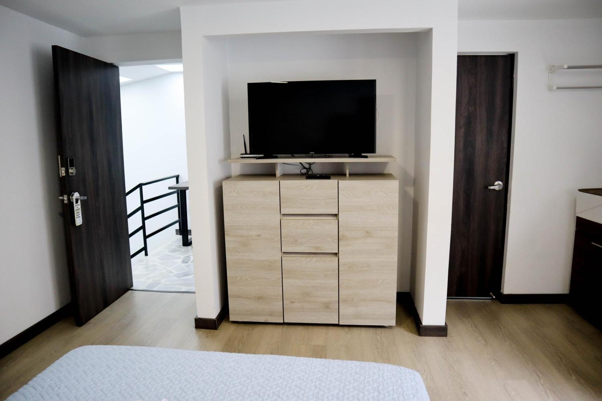 Apartahotel La Arboleda Hc 马尼萨莱斯 外观 照片